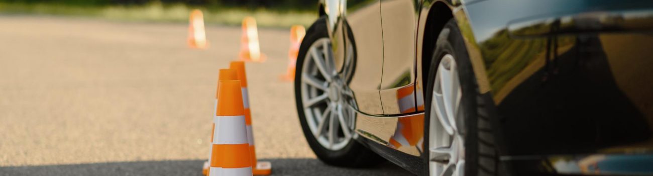 car-orange-traffic-cones-lesson-driving-school-concept (Copy)